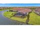 Luxury home with private pool and spa, overlooking a lake at 4612 Stickley Ct, Palmetto, FL 34221