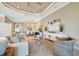 Light and airy living room with a neutral color palette and stylish furnishings at 4612 Stickley Ct, Palmetto, FL 34221
