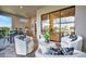 Relaxing patio with seating area and outdoor kitchen at 4612 Stickley Ct, Palmetto, FL 34221