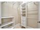 Spacious walk-in closet with ample shelving and hanging space at 4612 Stickley Ct, Palmetto, FL 34221