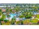 Community pool with expansive deck and lush landscaping at 4612 Stickley Ct, Palmetto, FL 34221