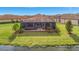 Single-story home with a pool and spa, nestled in a peaceful community at 4612 Stickley Ct, Palmetto, FL 34221
