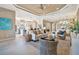 Open concept living area with a view of kitchen and dining areas at 4612 Stickley Ct, Palmetto, FL 34221