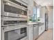 Modern kitchen with stainless steel appliances and stylish cabinetry at 4612 Stickley Ct, Palmetto, FL 34221