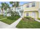 Brightly colored townhouses with landscaping at 4708 Sabal Key Dr, Bradenton, FL 34203