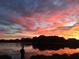 Enjoy breathtaking sunsets over the lake from your backyard at 5951 Snowy Egret Dr, Sarasota, FL 34238