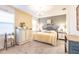 Spacious main bedroom with a large bed and attached bathroom at 8256 Enclave Way # 101, Sarasota, FL 34243