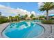 Inviting resort-style pool with a large deck and lounge chairs at 8256 Enclave Way # 101, Sarasota, FL 34243