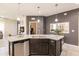 Modern kitchen with stainless steel appliances and granite countertops at 8256 Enclave Way # 101, Sarasota, FL 34243