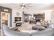 Open-concept living room showcasing modern design with a seamless flow to the kitchen and dining area at 8256 Enclave Way # 101, Sarasota, FL 34243