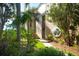 View of the condo exterior with a landscaped walkway, offering curb appeal at 8706 54Th W Ave # 18, Bradenton, FL 34210