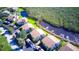 Aerial view of community with pool and canal access at 8706 54Th W Ave # 18, Bradenton, FL 34210
