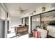 Relaxing lanai with wicker furniture and sliding glass doors at 8706 54Th W Ave # 18, Bradenton, FL 34210