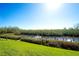 Scenic waterfront view with boat slips and lush greenery at 8706 54Th W Ave # 18, Bradenton, FL 34210