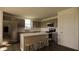 Modern kitchen with stainless steel appliances and an island at 13028 Cedar Elm Lane, Parrish, FL 34219