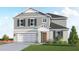 Two-story house with gray siding and a white garage door at 13028 Cedar Elm Lane, Parrish, FL 34219
