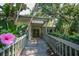 Harbor Club community center entrance with walkway at 1717 Pelican Cove Rd # 334, Sarasota, FL 34231