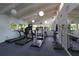 Bright fitness center with treadmills and exercise bikes at 1717 Pelican Cove Rd # 334, Sarasota, FL 34231