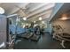 Community fitness center with various cardio equipment at 1717 Pelican Cove Rd # 334, Sarasota, FL 34231