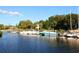 Calm waters and docked boats along the canal at 1717 Pelican Cove Rd # 334, Sarasota, FL 34231