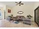 Bright living room with comfy seating and large windows at 220 Inlets Blvd, Nokomis, FL 34275