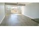 Bright living room with wood-look floors and large window at 33 S Gulfstream Ave # 307, Sarasota, FL 34236