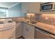 Updated kitchen with granite countertops and stainless steel appliances at 33 S Gulfstream Ave # 307, Sarasota, FL 34236