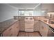 Updated kitchen with granite countertops and stainless steel appliances at 33 S Gulfstream Ave # 307, Sarasota, FL 34236