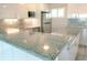 Modern kitchen featuring granite countertops and stainless steel appliances at 33 S Gulfstream Ave # 307, Sarasota, FL 34236