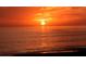 Stunning ocean sunset view with orange and red hues at 3712 Hampshire Ln # 5623, Sarasota, FL 34232