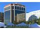 Modern glass office building reflecting cityscape at 3712 Hampshire Ln # 5623, Sarasota, FL 34232