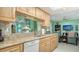 Updated kitchen with ample counter space and wood cabinets at 3712 Hampshire Ln # 5623, Sarasota, FL 34232