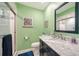 Bathroom features a marble vanity and walk-in shower at 3712 Hampshire Ln # 5623, Sarasota, FL 34232
