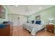 Main bedroom with hardwood floors and large closets at 3712 Hampshire Ln # 5623, Sarasota, FL 34232