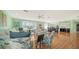 Spacious living area featuring light wood floors and ample natural light at 3712 Hampshire Ln # 5623, Sarasota, FL 34232
