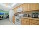 Bright kitchen with granite countertops and modern appliances at 3712 Hampshire Ln # 5623, Sarasota, FL 34232