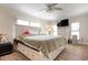 Large main bedroom with a king-size bed, plenty of storage, and wood-look floors at 4011 Midland Rd, Sarasota, FL 34231