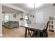 Dining room with wood table and chairs, and hardwood floors at 4011 Midland Rd, Sarasota, FL 34231