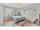 Cozy bedroom with a starfish-themed bedspread and ensuite bathroom access at 4803 Park Acres Dr, Bradenton, FL 34207