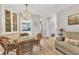 Cozy dining area with a glass-top table and wicker chairs at 4803 Park Acres Dr, Bradenton, FL 34207