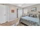 Bright bedroom with beach-themed decor and an ensuite bathroom at 4803 Park Acres Dr, Bradenton, FL 34207