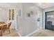 Bright entryway with view of kitchen and dining area at 4803 Park Acres Dr, Bradenton, FL 34207