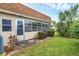 Florida-style home with a screened-in patio and backyard at 4803 Park Acres Dr, Bradenton, FL 34207