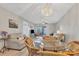 Open dining area with wicker chairs and a glass-top table at 4803 Park Acres Dr, Bradenton, FL 34207