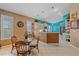 Kitchen with breakfast nook and view into living room at 6023 Wingspan Way, Bradenton, FL 34203
