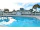 Community pool and clubhouse with a relaxing atmosphere at 6023 Wingspan Way, Bradenton, FL 34203