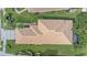 Top-down view of the home showcasing its roofline and landscaping at 6023 Wingspan Way, Bradenton, FL 34203