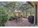 Relaxing screened patio with seating area at 6023 Wingspan Way, Bradenton, FL 34203