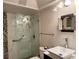 Updated bathroom with walk-in shower, vessel sink & modern fixtures at 6447 Egret Ln # 413, Bradenton, FL 34210