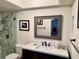 Clean bathroom with vanity and mirror at 6447 Egret Ln # 413, Bradenton, FL 34210